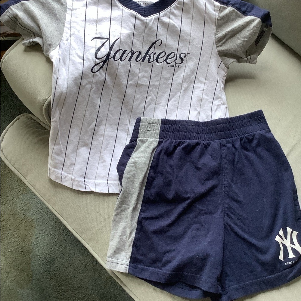 Genuine Merchandise White Pinstripe Tee with Navy Trim
